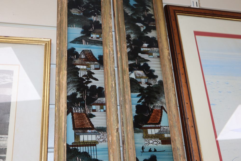 A pair of Japanese reverse painted glass panels, framed